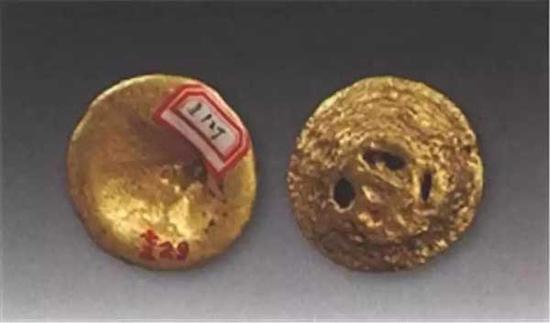 图一三咸阳窑店毛王沟大队朱才均上交凹面金饼