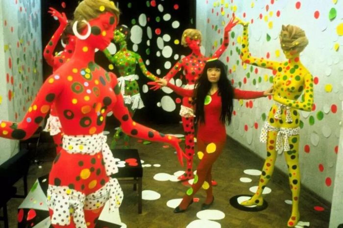 Yayoi Kusama in the Orez Gallery in the Hague, Netherlands (1965) in Kusama - Infinity, directed by Heather Lenz. Photo credit: Harrie Verstappen. Courtesy of Magnolia Pictures.